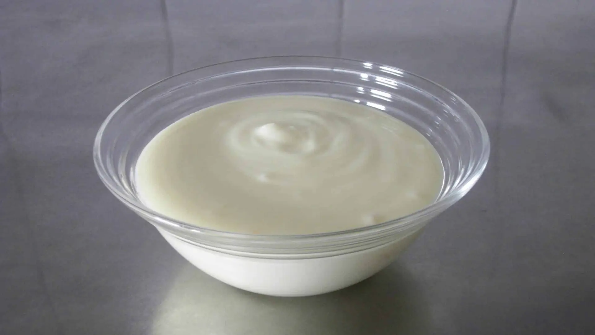 a bowl of white yogurt 